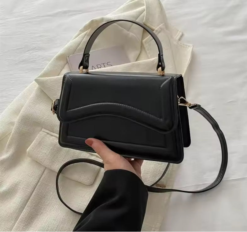 Adele Classic Saddle Bag