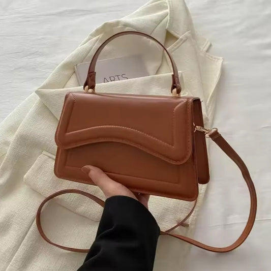 Adele Classic Saddle Bag